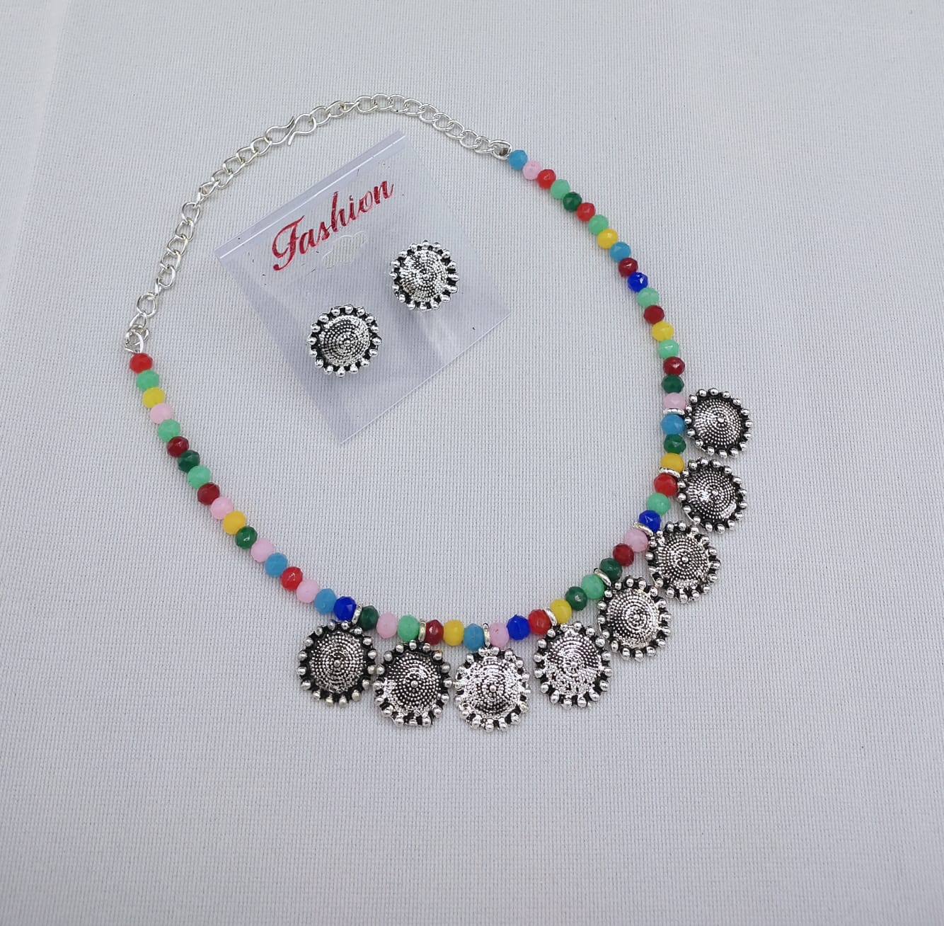 Multi-Color Beaded Necklace with Oxidized Silver Coins